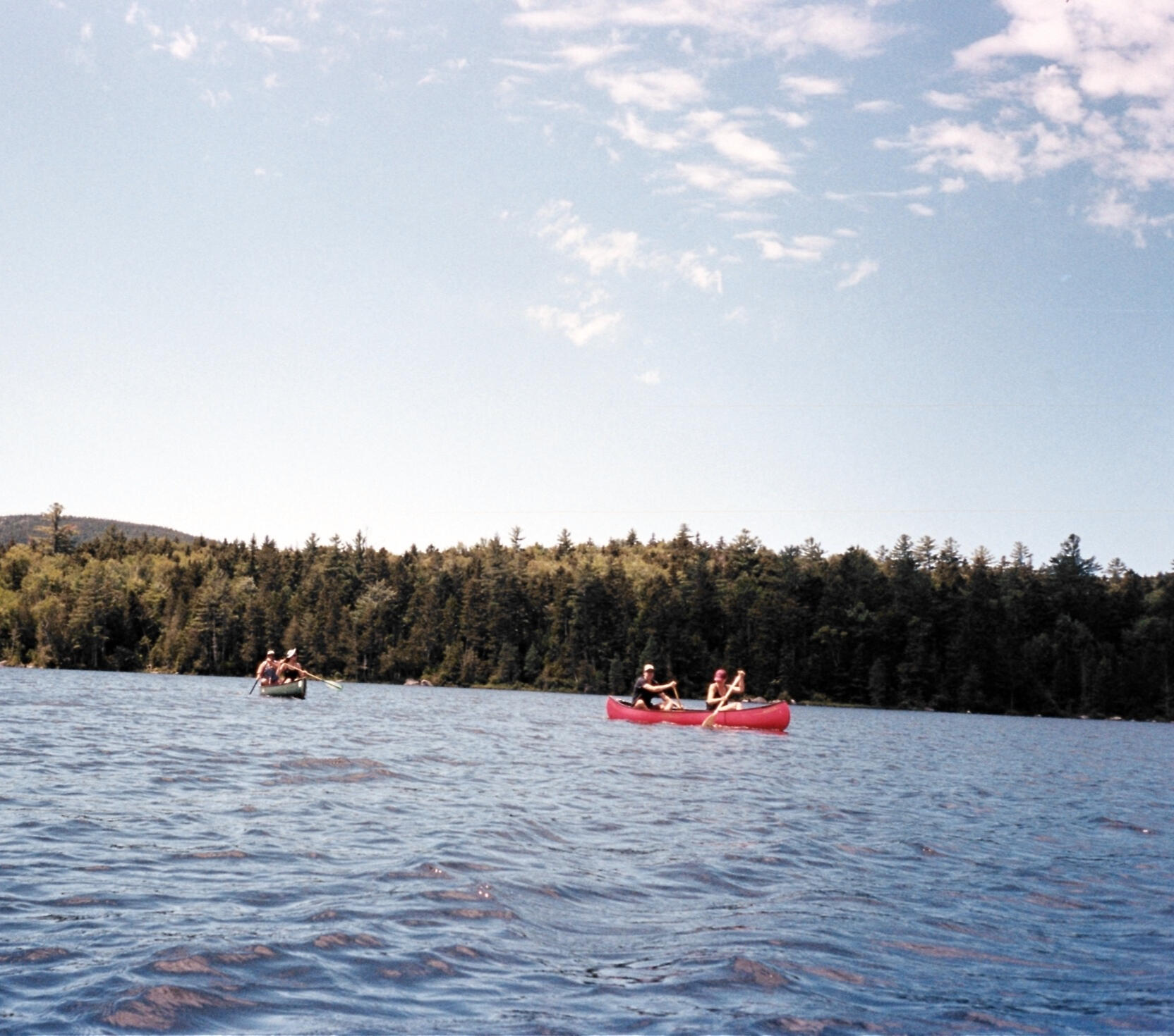 Two canoes on a lake